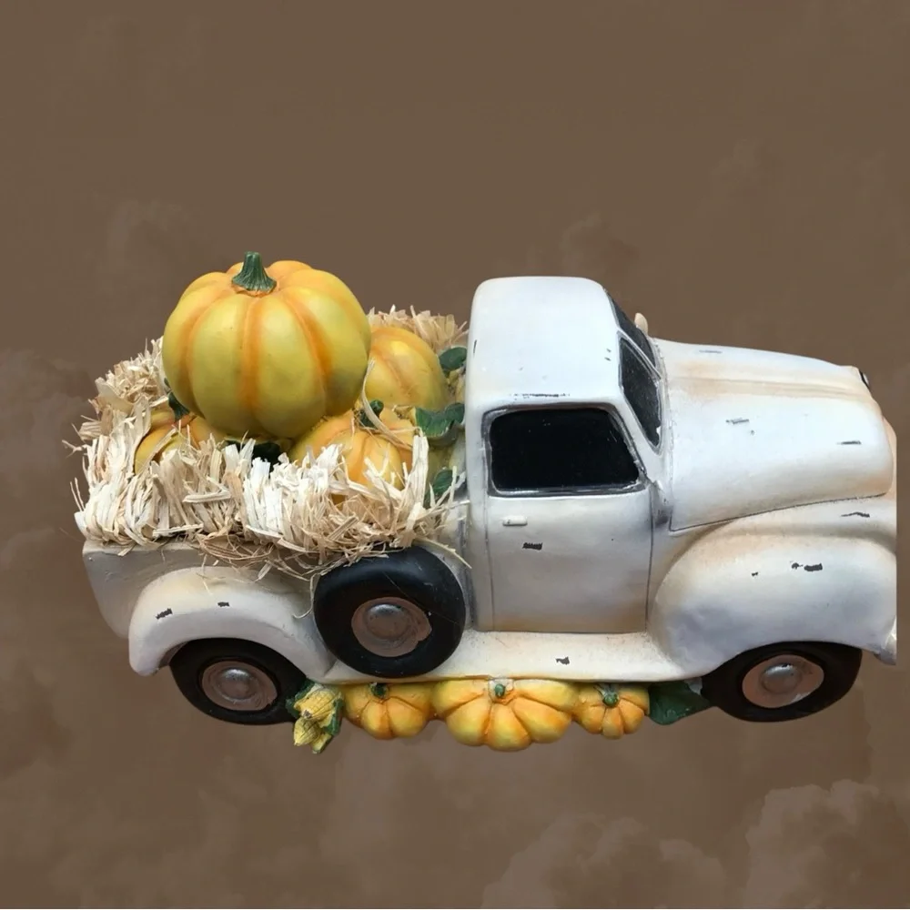 Plow & Hearth in orig.box vintage truck full of pumpkins. Great fall display.